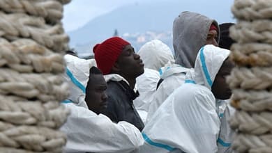 TRAFIC DE MIGRANTS: UN ERYTHRÉEN EXTRADÉ DU SOUDAN VERS L'ITALIE 6 Des migrants secourus en mer, à leur arrivée le 1er février 2016 à Messine en Italie | AFP/Archives | GIOVANNI ISOLINO