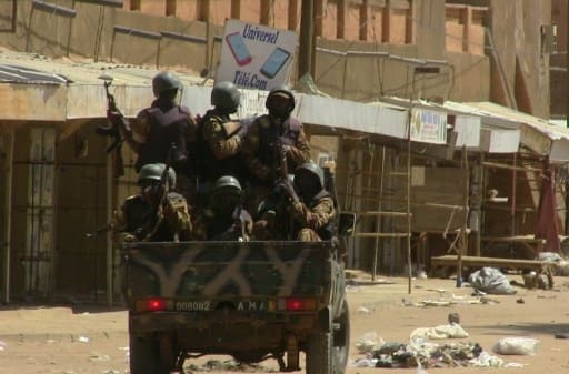 Des soldats maliens, le 12 juillet 2016 à Gao | AFP/Archives | SOULEYMANE AG ANARA