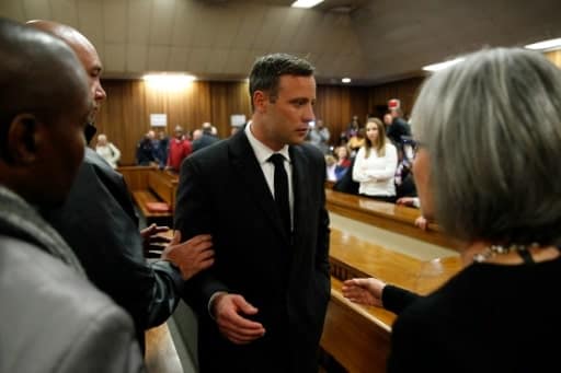 Oscar Pistorius quitte le tribunal à Prétoria, le 6 juillet 2016 | POOL/AFP/Archives | MARCO LONGARI