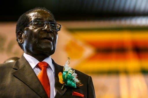 Robert Mugabe, ici le 7 avril 2016 à Harare a affirmé avoir été placé en résidence surveillée | AFP:Archives | Jekesai NJIKIZANA