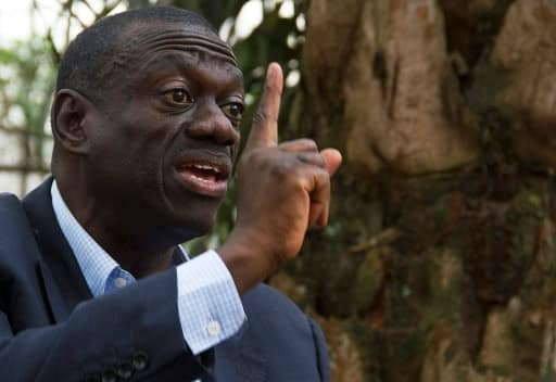 L'opposant historique ougandais Kizza Besigye, le 26 février 2014 à Kampala | AFP/Archives | ISAAC KASAMANI